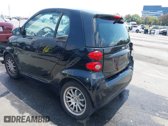 2012 Smart fortwo Pure z VIN WMEEJ3BA1CK556029, wystawiony jako IAAI lot #42173735 z przebiegiem 85 133 mil mil oraz . Historia ofert i sprzedaży dostępna na DreamBid. Obrazek 3.