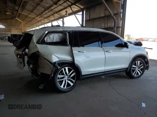 2018 Honda Pilot Touring с VIN 5FNYF6H98JB053524, выставлен на аукционе Copart как лот 61447785 с пробегом 114 942 миль миль и Списание • Salvage title. История ставок и продаж доступна на DreamBid. Изображение 3.