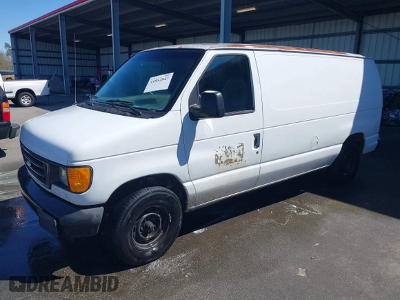 2003 Ford Econoline Cargo with VIN 1FTRE14W03HB60401, listed as a IAAI auction lot 41852847 with 325,883 mi miles. Bid and sale history available at carsss.com. Image 2.
