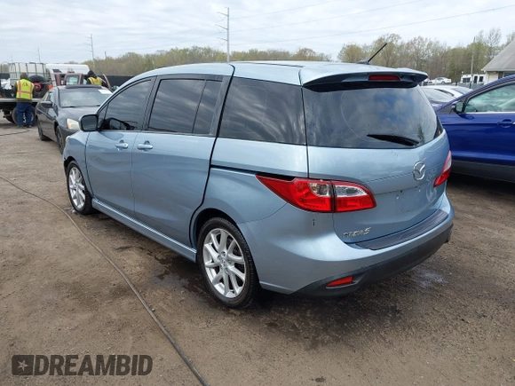 2012 Mazda 5 Grand Touring with VIN JM1CW2DL4C0141511, listed as a IAAI auction lot 42001392 with 99,097 mi miles and . Bid and sale history available at carsss.com. Image 3.