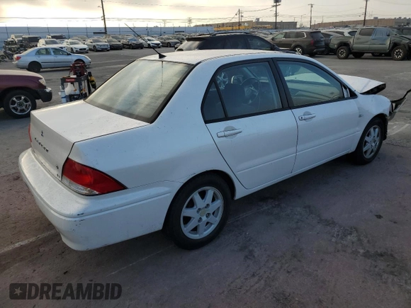 2002 Mitsubishi Lancer LS with VIN JA3AJ36E02U064779, listed as a Copart auction lot 86749184 with 127,343 mi miles and Salvage Title. Bid and sale history available at carsss.com. Image 3.