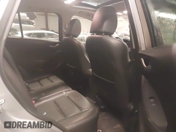 2014 Mazda CX-5 Grand Touring with VIN JM3KE4DY5E0305882, listed as a IAAI auction lot 41879532 with 173,443 mi miles. Bid and sale history available at carsss.com. Image 8.