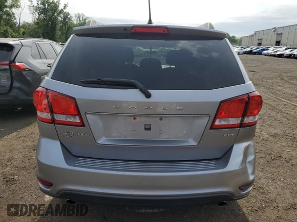 2017 Dodge Journey SXT with VIN 3C4PDDBG4HT608395, listed as a Copart auction lot 60811885 with 145,503 mi miles and Salvage title. Bid and sale history available at DreamBid. Image 6.