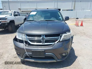 2017 Dodge Journey SXT z VIN 3C4PDCBB9HT507917, wystawiony jako IAAI lot #42322823 z przebiegiem 131 011 mil mil oraz . Historia ofert i sprzedaży dostępna na DreamBid. Obrazek 13.
