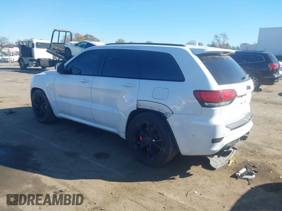 2017 Jeep Grand Cherokee SRT with VIN 1C4RJFDJ6HC754640, listed as a IAAI auction lot 40944008 with 93,412 mi miles. Bid and sale history available at carsss.com. Image 3.