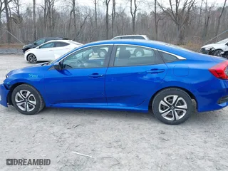2016 Honda Civic Sedan LX with VIN 19XFC2F51GE233385, listed as a IAAI auction lot 42043765 with 112,253 mi miles. Bid and sale history available at carsss.com. Image 14.
