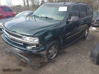 2002 Chevrolet Tahoe LT with VIN 1GNEK13ZX2J277968, listed as a IAAI auction lot 41586260 with 336,190 mi miles. Bid and sale history available at carsss.com. Image 6.