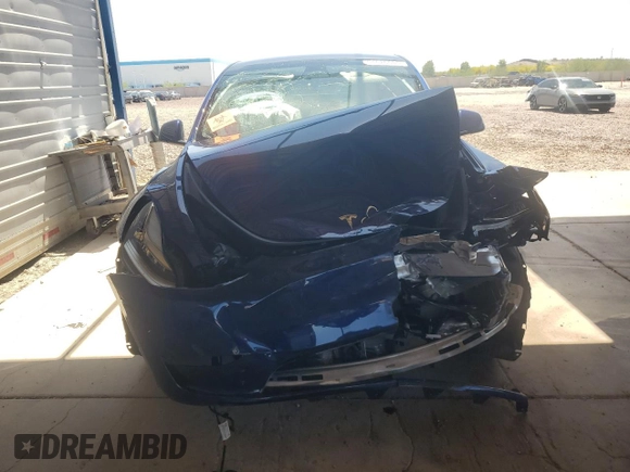 2023 Tesla Model Y Long Range with VIN 7SAYGDEE7PA112865, listed as a Copart auction lot 54626685 with 10,720 mi miles and Salvage Title. Bid and sale history available at DreamBid. Image 5.