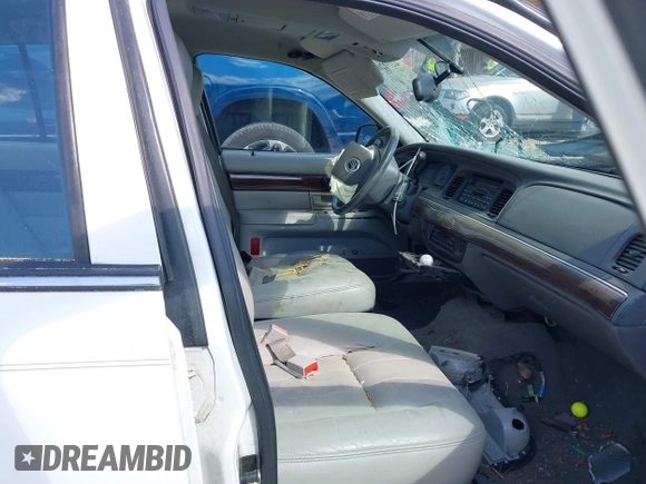 2003 Mercury Grand Marquis LS Premium with VIN 2MEFM75W53X699635, listed as a IAAI auction lot 42002694 with 154,781 mi miles and . Bid and sale history available at DreamBid. Image 5.