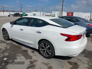 2016 Nissan Maxima S with VIN 1N4AA6AP2GC430689, listed as a IAAI auction lot 41913701 with 132,637 mi miles and . Bid and sale history available at DreamBid. Image 3.