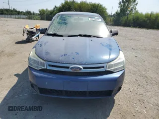 2009 Ford Focus SE with VIN 1FAHP35N69W173977, listed as a Copart auction lot 69018554 with 138,496 mi miles and Salvage Title. Bid and sale history available at carsss.com. Image 5.