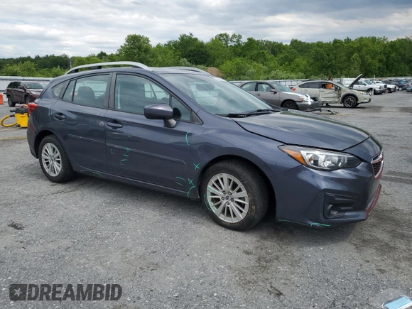 2017 Subaru Impreza Premium with VIN 4S3GTAD61H3711128, listed as a Copart auction lot 58942425 with 127,890 mi miles and Salvage title. Bid and sale history available at DreamBid. Image 4.