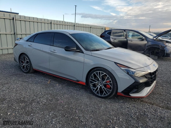 2023 Hyundai Elantra N with VIN KMHLW4AK7PU012566, listed as a Copart auction lot 77865934 with 19,758 mi miles and Clean Title. Bid and sale history available at carsss.com. Image 4.