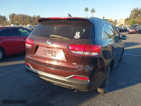 2016 Kia Sorento LX with VIN 5XYPG4A32GG058979, listed as a IAAI auction lot 41382462 with 119,655 mi miles. Bid and sale history available at carsss.com. Image 4.