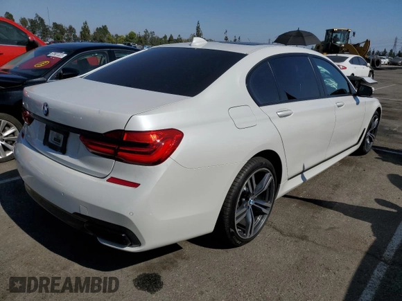 2018 BMW 7 Series 740i with VIN WBA7E2C5XJB214886, listed as a Copart auction lot 57833143 with 39,975 mi miles. Bid and sale history available at carsss.com. Image 3.