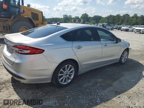2017 Ford Fusion SE z VIN 3FA6P0H74HR164747, wystawiony jako Copart lot #56139855 z przebiegiem 105 769 mil mil oraz Szkoda całkowita • Salvage title. Historia ofert i sprzedaży dostępna na DreamBid. Obrazek 3.