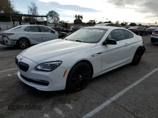 2012 BMW 6 Series 650i z VIN WBALX3C52CC528740, wystawiony jako Copart lot #44058465 z przebiegiem 75 132 mil mil oraz Szkoda całkowita • Salvage title. Historia ofert i sprzedaży dostępna na DreamBid. Obrazek 1.