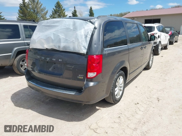 2018 Dodge Grand Caravan SXT z VIN 2C4RDGCG8JR129835, wystawiony jako IAAI lot #42190326 z przebiegiem 81 818 mil mil oraz . Historia ofert i sprzedaży dostępna na DreamBid. Obrazek 4.