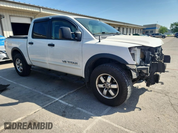 2012 Nissan Titan SL with VIN 1N6BA0EC9CN324495, listed as a Copart auction lot 60982445 with 142,430 mi miles and Salvage title. Bid and sale history available at DreamBid. Image 4.