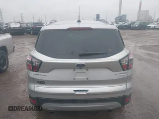 2017 Ford Escape Titanium with VIN 1FMCU0J96HUC21987, listed as a IAAI auction lot 41971376 with 97,488 mi miles and . Bid and sale history available at DreamBid. Image 16.