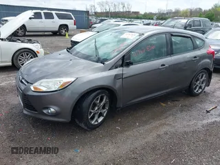 2014 Ford Focus SE with VIN 1FADP3K28EL337377, listed as a IAAI auction lot 41962856 with 137,906 mi miles. Bid and sale history available at carsss.com. Image 2.