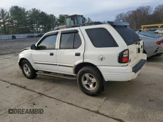 2003 Isuzu Rodeo with VIN 4S2DM58W034303129, listed as a Copart auction lot 83757734 with 114,274 mi miles and Salvage Title. Bid and sale history available at DreamBid. Image 2.
