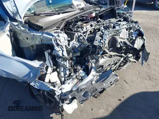 2023 Honda Civic Sport z VIN 2HGFE2F50PH556813, wystawiony jako IAAI lot #41364523 z przebiegiem 8 999 mil mil oraz . Historia ofert i sprzedaży dostępna na DreamBid. Obrazek 6.