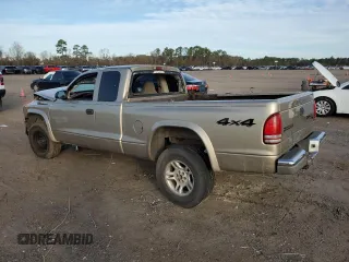 2003 Dodge Dakota SLT with VIN 1D7HG42N43S198823, listed as a Copart auction lot 88120315 with 0 mi miles and Salvage Title. Bid and sale history available at carsss.com. Image 2.