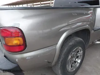 2003 GMC Sierra 1500 SLT with VIN 1GTEC19TX3Z212534, listed as a IAAI auction lot 41591390 with 158,457 mi miles. Bid and sale history available at carsss.com. Image 12.