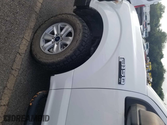 2020 Ford F-150 XL with VIN 1FTFX1E51LFA15219, listed as a IAAI auction lot 42777833 with 129,745 mi miles and . Bid and sale history available at DreamBid. Image 25.