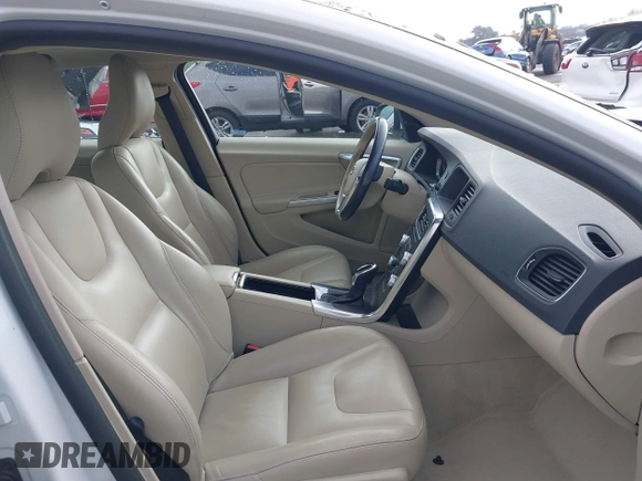 2015 Volvo S60 T5 Drive-E Premier with VIN YV126MFK4F2349564, listed as a IAAI auction lot 41711836 with 59,897 mi miles. Bid and sale history available at carsss.com. Image 5.