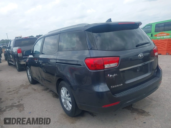 2015 Kia Sedona LX with VIN KNDMB5C16F6065437, listed as a IAAI auction lot 42079430 with 149,991 mi miles and . Bid and sale history available at DreamBid. Image 3.