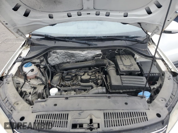 2013 Volkswagen Tiguan SE with VIN WVGAV3AX1DW574009, listed as a Copart auction lot 60936735 with 121,624 mi miles and Clean title. Bid and sale history available at DreamBid. Image 12.