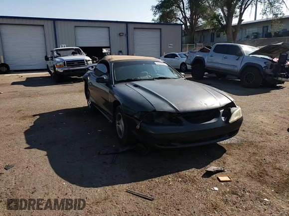 1998 Ford Mustang with VIN 1FAFP444XWF176396, listed as a Copart auction lot 61322984 with 86,168 mi miles and Salvage title. Bid and sale history available at DreamBid. Image 11.