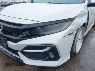 2020 Honda Civic Si z VIN 2HGFC1E59LH707630, wystawiony jako IAAI lot #41764310 z przebiegiem 116 714 mil mil oraz . Historia ofert i sprzedaży dostępna na DreamBid. Obrazek 12.