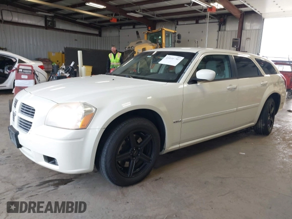 2006 Dodge Magnum z VIN 2D8GZ57286H100782, wystawiony jako IAAI lot #41816780 z przebiegiem 203 839 mil mil oraz . Historia ofert i sprzedaży dostępna na DreamBid. Obrazek 2.