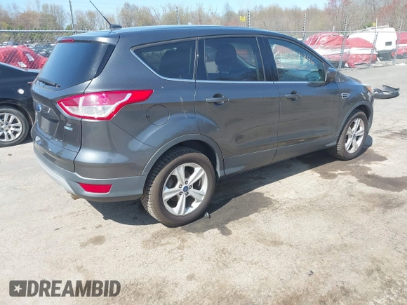 2016 Ford Escape SE with VIN 1FMCU9GX6GUB25849, listed as a IAAI auction lot 42087346 with 189,909 mi miles. Bid and sale history available at carsss.com. Image 4.
