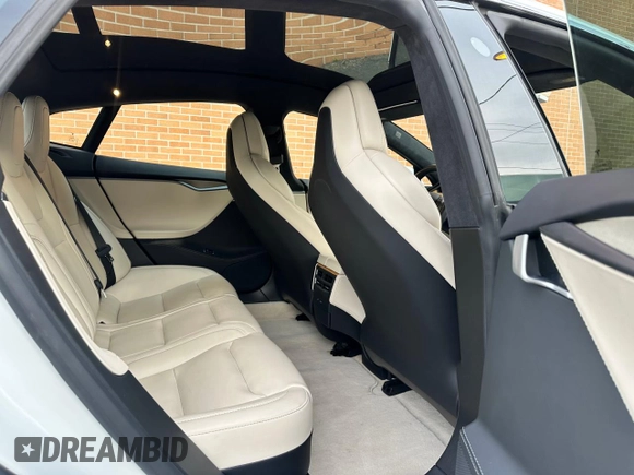 2019 Tesla Model S 75D with VIN 5YJSA1E28KF333962, listed as a Copart auction lot 54815975 with 21,203 mi miles and Salvage title. Bid and sale history available at DreamBid. Image 7.