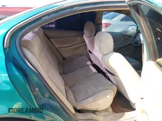1999 Oldsmobile Alero GL z VIN 1G3NL52T0XC354966, wystawiony jako IAAI lot #42259258 z przebiegiem Nie podano mil oraz . Historia ofert i sprzedaży dostępna na DreamBid. Obrazek 8.