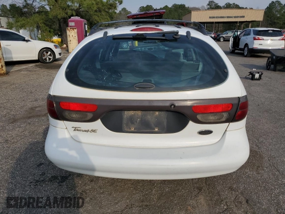 1999 Ford Taurus SE z VIN 1FAFP58S0XA272714, wystawiony jako Copart lot #48966215 z przebiegiem 255 885 mil mil oraz Szkoda całkowita • Salvage title. Historia ofert i sprzedaży dostępna na DreamBid. Obrazek 6.
