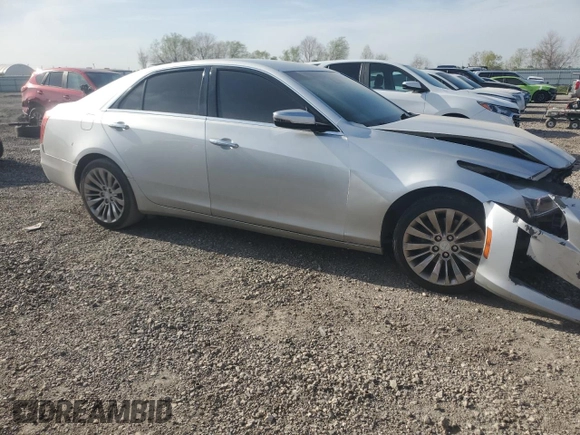 2014 Cadillac CTS Luxury AWD with VIN 1G6AX5SX9E0141473, listed as a Copart auction lot 49163265 with 142,361 mi miles and Salvage Title. Bid and sale history available at DreamBid. Image 4.