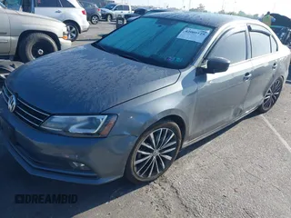 2016 Volkswagen Jetta Sport z VIN 3VWD17AJ0GM386504, wystawiony jako IAAI lot #42000125 z przebiegiem 90 405 mil mil oraz . Historia ofert i sprzedaży dostępna na DreamBid. Obrazek 17.
