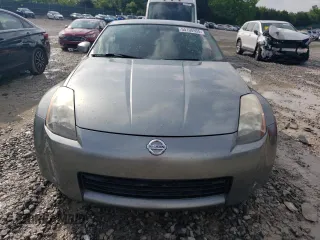 2004 Nissan 350Z Touring with VIN JN1AZ34D24M103656, listed as a Copart auction lot 55100955 with 130,561 mi miles and Salvage title. Bid and sale history available at DreamBid. Image 5.