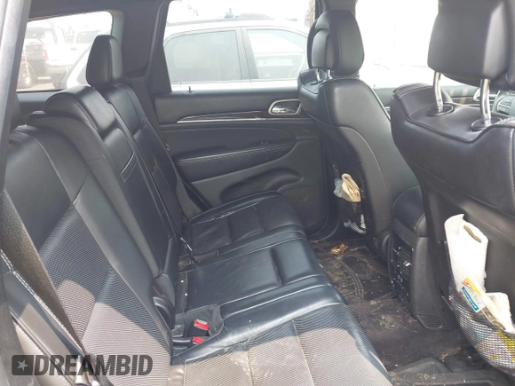 2017 Jeep Grand Cherokee Overland z VIN 1C4RJFCG4HC632929, wystawiony jako IAAI lot #42385321 z przebiegiem 205 593 mil mil oraz . Historia ofert i sprzedaży dostępna na DreamBid. Obrazek 8.