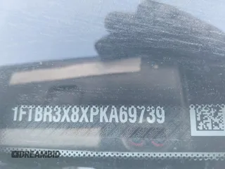 2023 Ford Transit Cargo z VIN 1FTBR3X8XPKA69739, wystawiony jako IAAI lot #41824302 z przebiegiem 67 703 mil mil oraz . Historia ofert i sprzedaży dostępna na DreamBid. Obrazek 9.