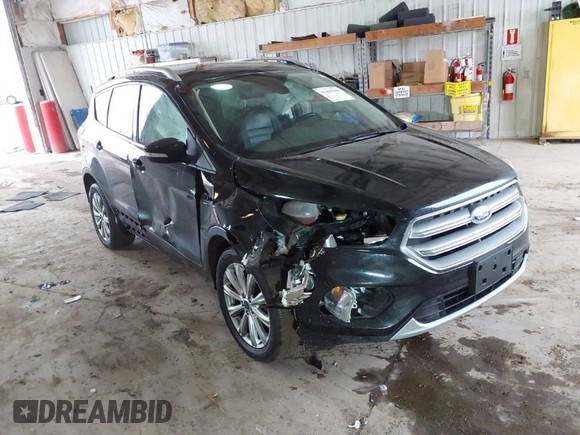 2017 Ford Escape Titanium with VIN 1FMCU0JD2HUE71179, listed as a IAAI auction lot 41465849 with 95,426 mi miles. Bid and sale history available at carsss.com. Image 1.