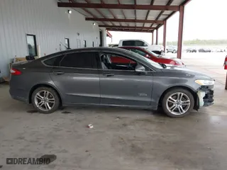 2016 Ford Fusion Energi Titanium with VIN 3FA6P0SU9GR103245, listed as a IAAI auction lot 41888435 with 123,975 mi miles. Bid and sale history available at carsss.com. Image 13.