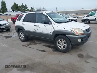 2006 Kia Sportage LX with VIN KNDJF723667293440, listed as a IAAI auction lot 41566559 with 171,681 mi miles and . Bid and sale history available at carsss.com. Image 1.
