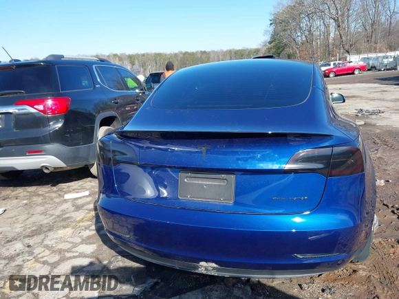 2023 Tesla Model 3 Long Range with VIN 5YJ3E1EB0PF688172, listed as a IAAI auction lot 41411580 with 21,125 mi miles and . Bid and sale history available at DreamBid. Image 16.