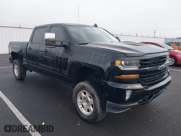 2017 Chevrolet Silverado 1500 LT with VIN 1GCUKREC1HF117744, listed as a IAAI auction lot 41091255 with 61,984 mi miles and . Bid and sale history available at DreamBid. Image 1.